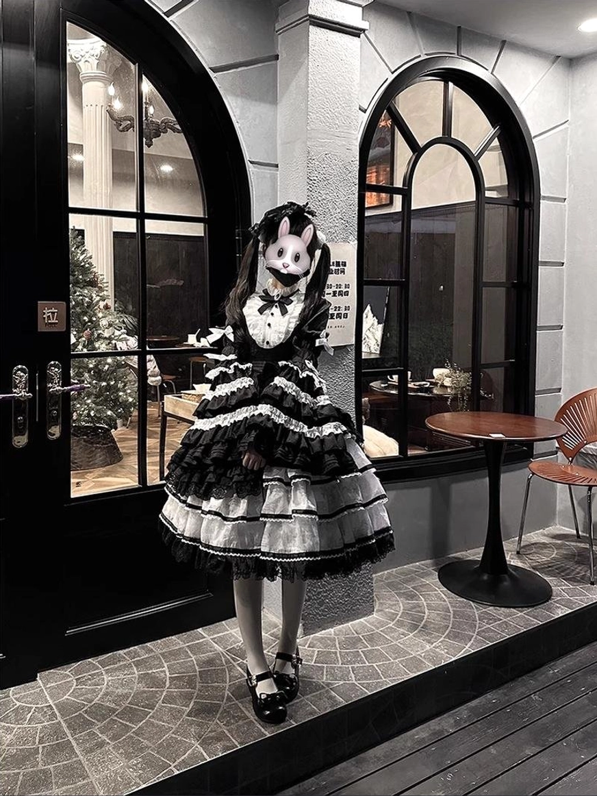 Solo puppet sweet lolita OP dress modeled indoor wearing with matching decorative hair accessories headpiece flower crown styling