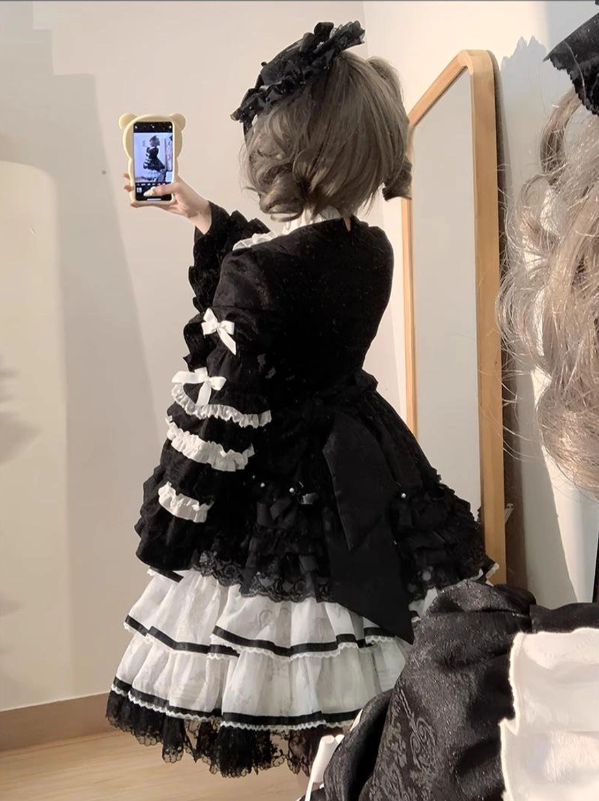 Sweet lolita OP dress modeled with lace gloves decorative accessories traditional lolita fashion styling accents