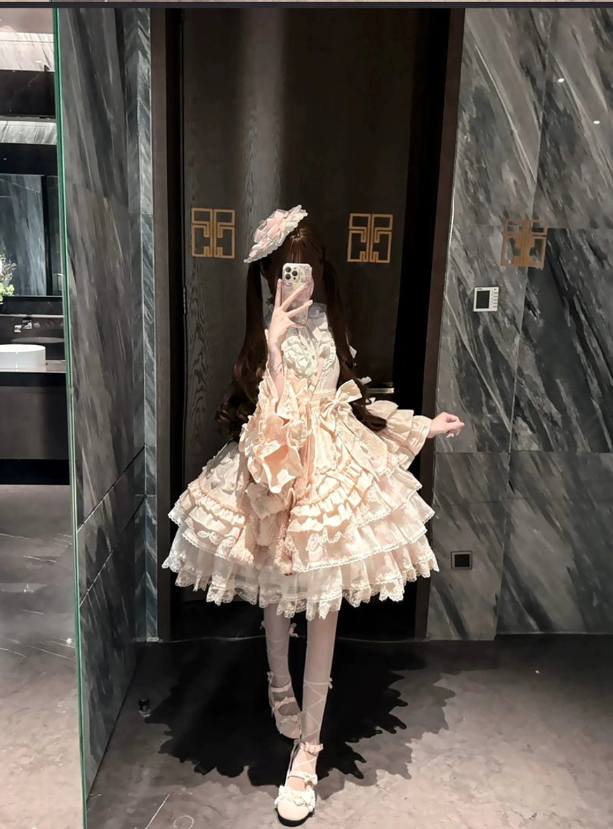 Sky blue solo puppet sweet lolita OP dress full-length standing pose indoor studio setting model wearing complete lolita coordinate princess long sleeves tiered ruffles A-line silhouette
