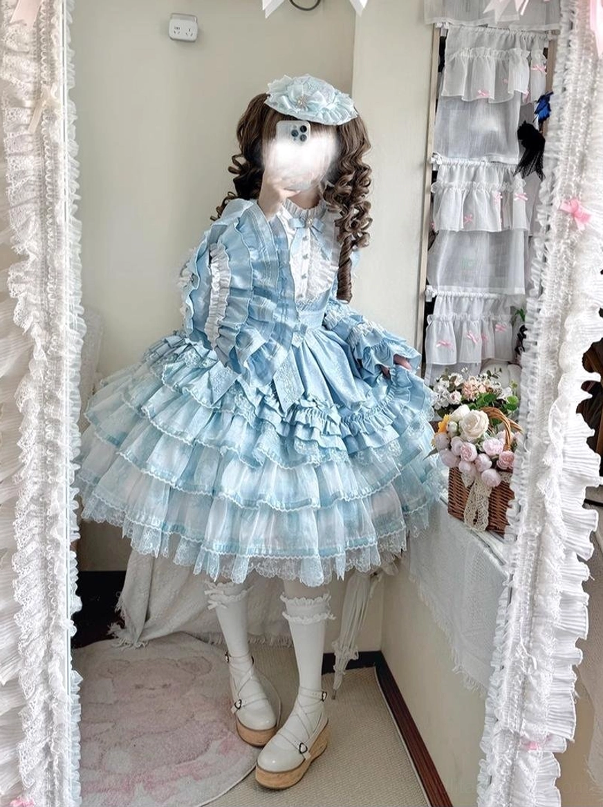 Sky blue sweet lolita OP dress side static view indoor room scene curly twin hair lolita blue beret ruffled lace trim sleeves stand collar flared A-line silhouette princess proportion