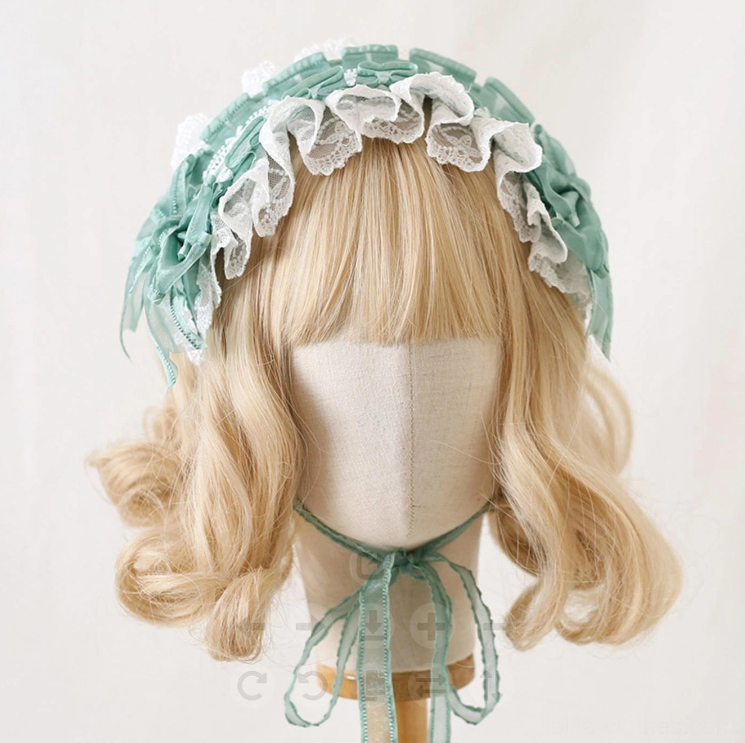 Spring grass green lolita lace hair clip headband with white lace base, multi-layer ruffled design, elegant side bow, and nature-inspired color palette