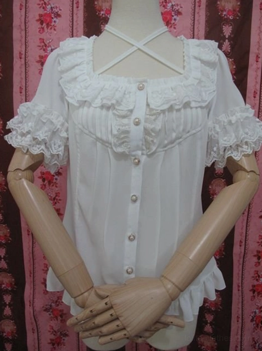 White chiffon lolita blouse front full view on articulated mannequin with jointed hands showing loose fit and ruffled hem