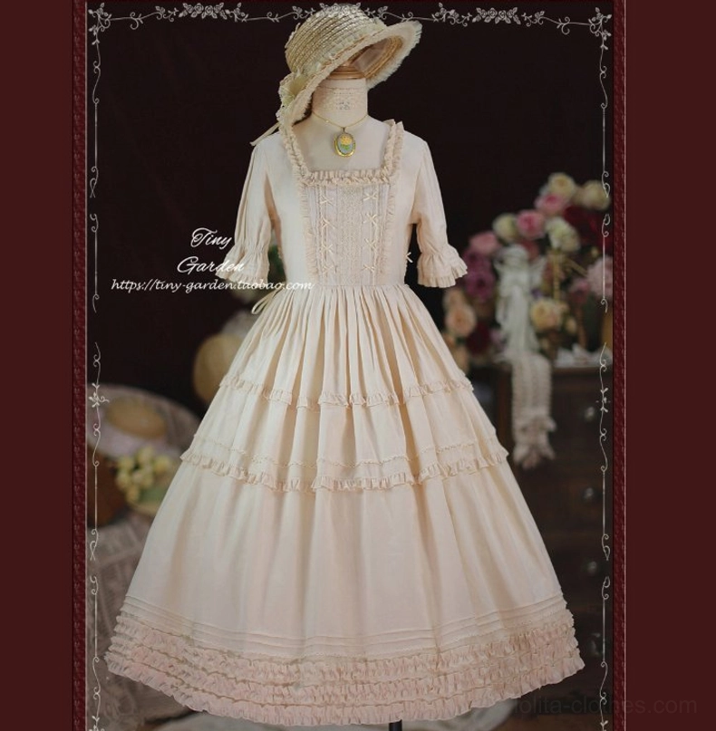 Detailed close-up view of square collar neckline pin tucks bodice and chest bow details on vintage lolita OP dress upper body construction
