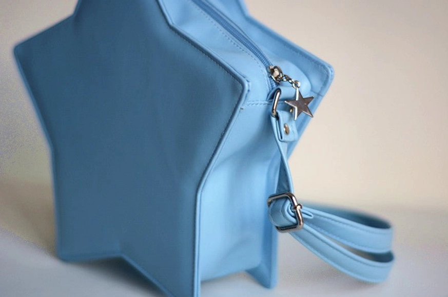 Star Lolita crossbody bag product angle view, whimsical five-pointed silhouette in multiple colorways, Sweet Lolita aesthetic shoulder messenger style