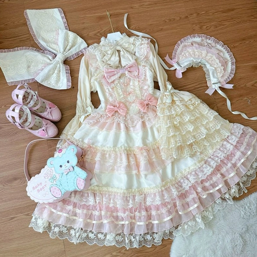Star Love Song sweet lolita coordinating blouse apricot version featuring ruffled hem, puff sleeves, and refined bow collar design