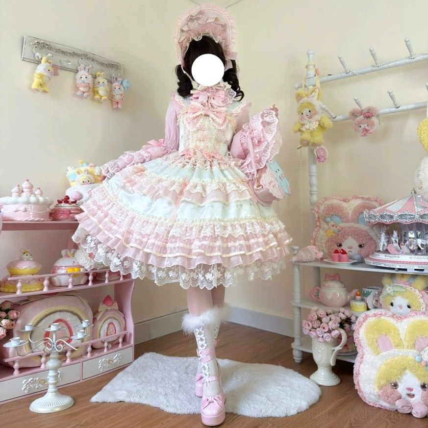 Star Love Song sweet lolita JSK dress hem detail showcasing tiered ruffle construction, lace trim finishing, and pearl ornament placement
