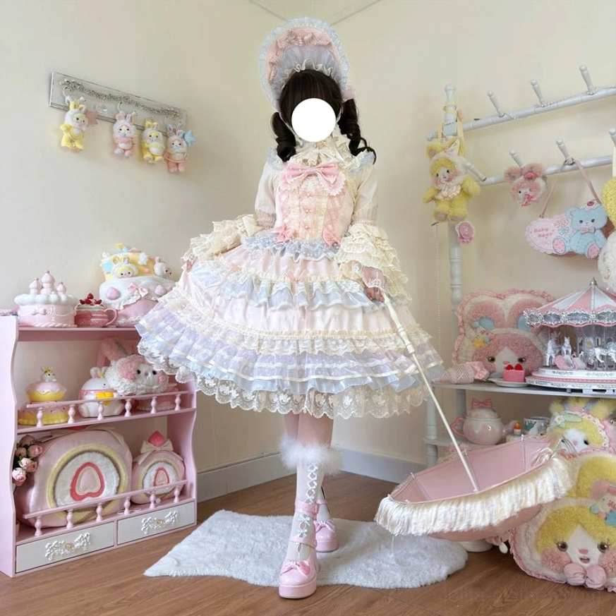 Star Love Song wedding sweet lolita JSK dress front three-quarter view with tiered ruffle skirt, pearl decorations, chest bow, matching bonnet, and lace parasol