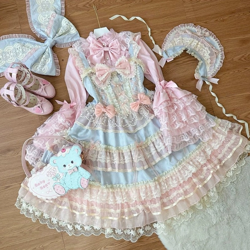 Star Love Song sweet lolita coordinating blouse white version with tiered ruffles, princess sleeves, and bow neckline detail