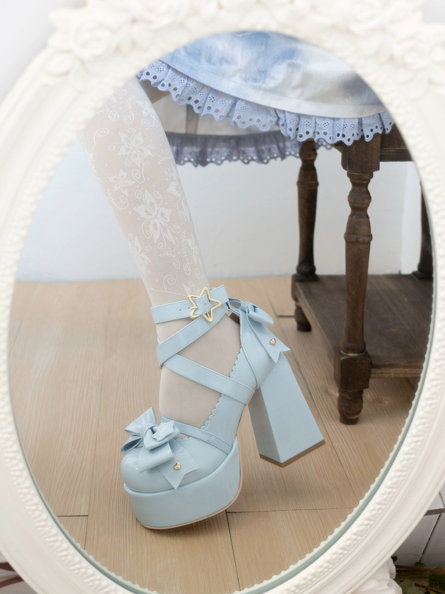 Close-up blue patent lolita heels fluffy mat vintage decor bow star buckle gold toe stud thick heel structure