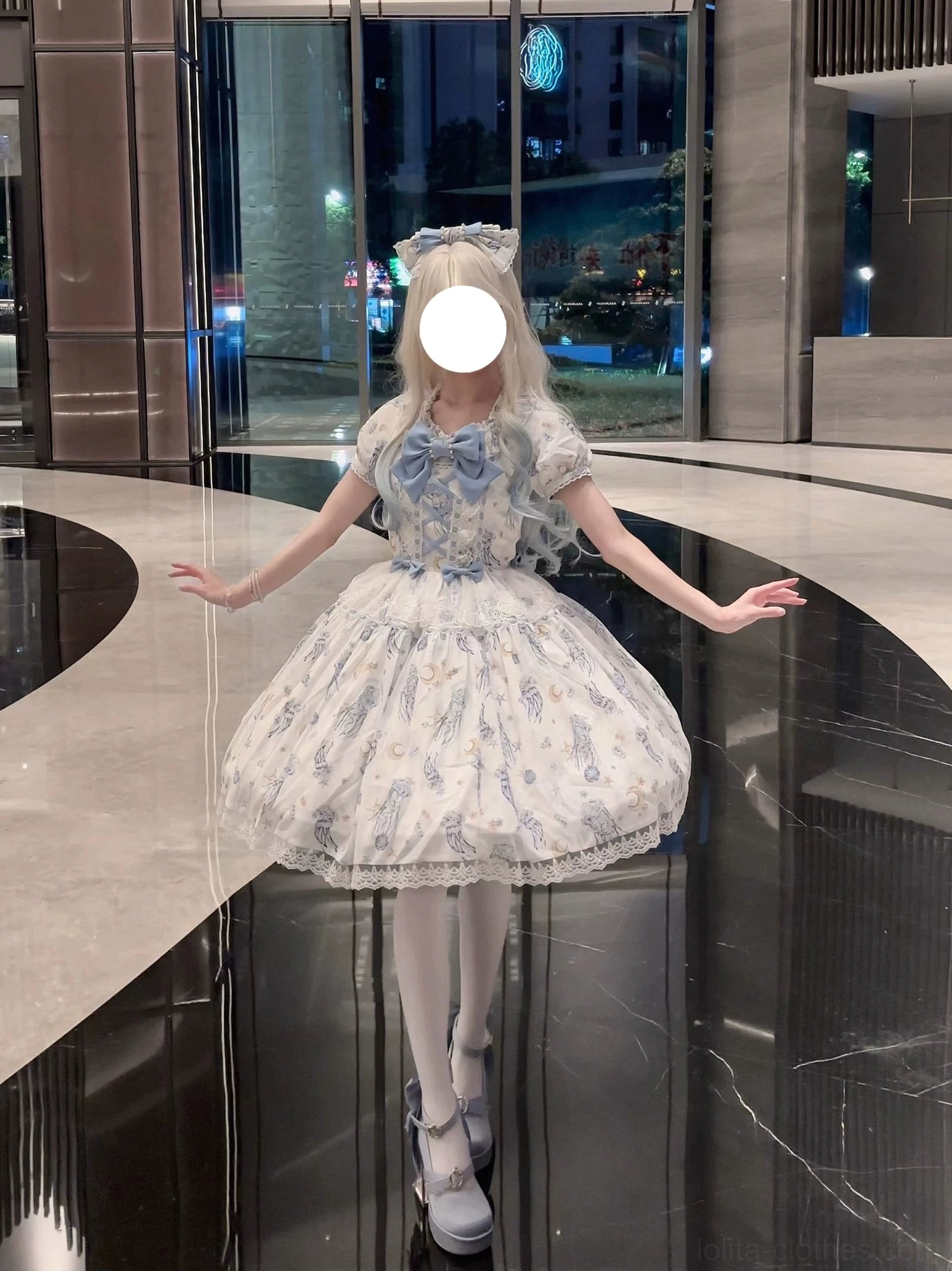 Starry jellyfish classic lolita short-sleeve OP dress front view blue base print ruffled tiered skirt lace trim modern styling
