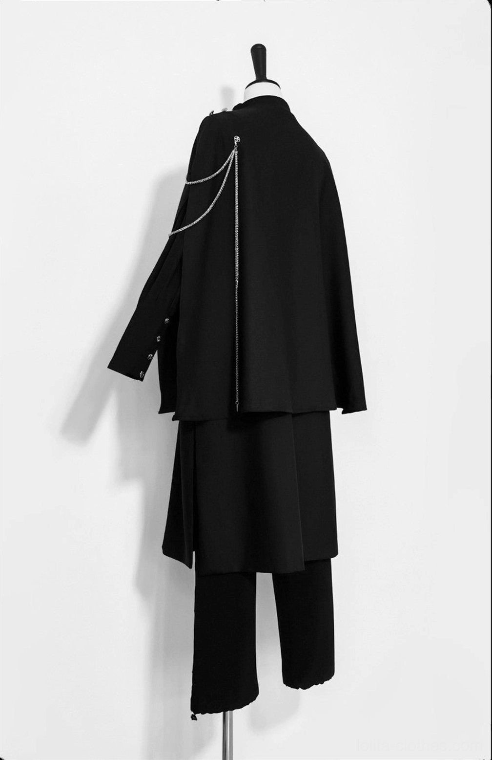 Stars Change Ouji black cape with silver chain embellishment side rear view on dress form matching black trousers lolita fashion silhouette