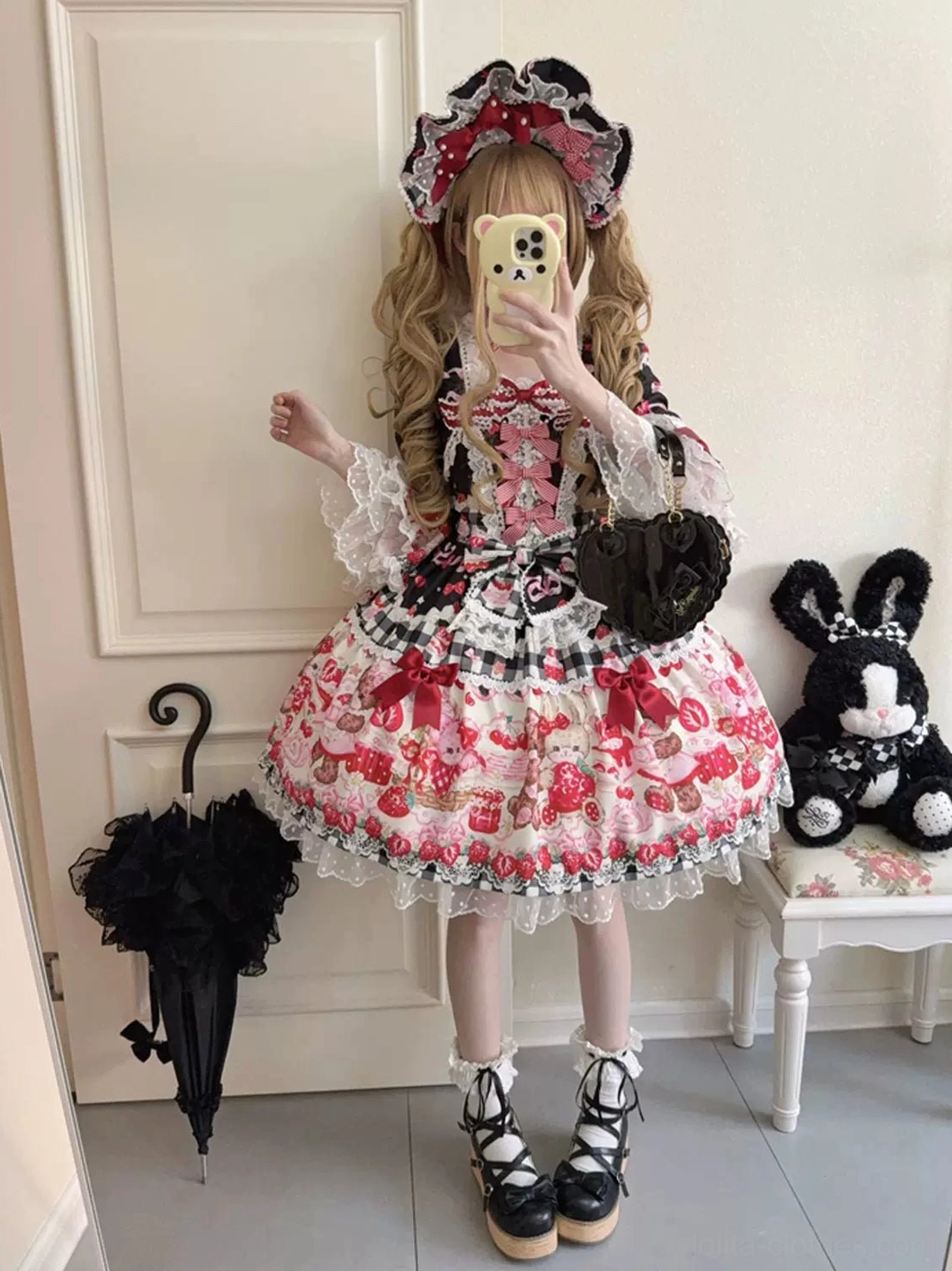 Sweet lolita OP dress matching bonnet accessory detail showing print coordination, ruffled construction, bow embellishment, and complete coordinate aesthetic