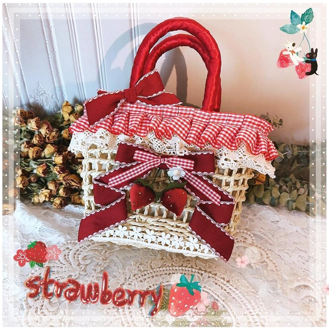 Beige strawberry gingham Country Lolita straw tote bag with red ribbon bows, lace ruffles, strawberry ornaments and crossbody strap
