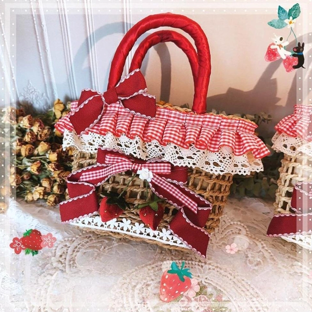 Brown strawberry gingham Country Lolita straw tote bag with red top handles, lace-edged ruffles and strawberry ribbon ornaments