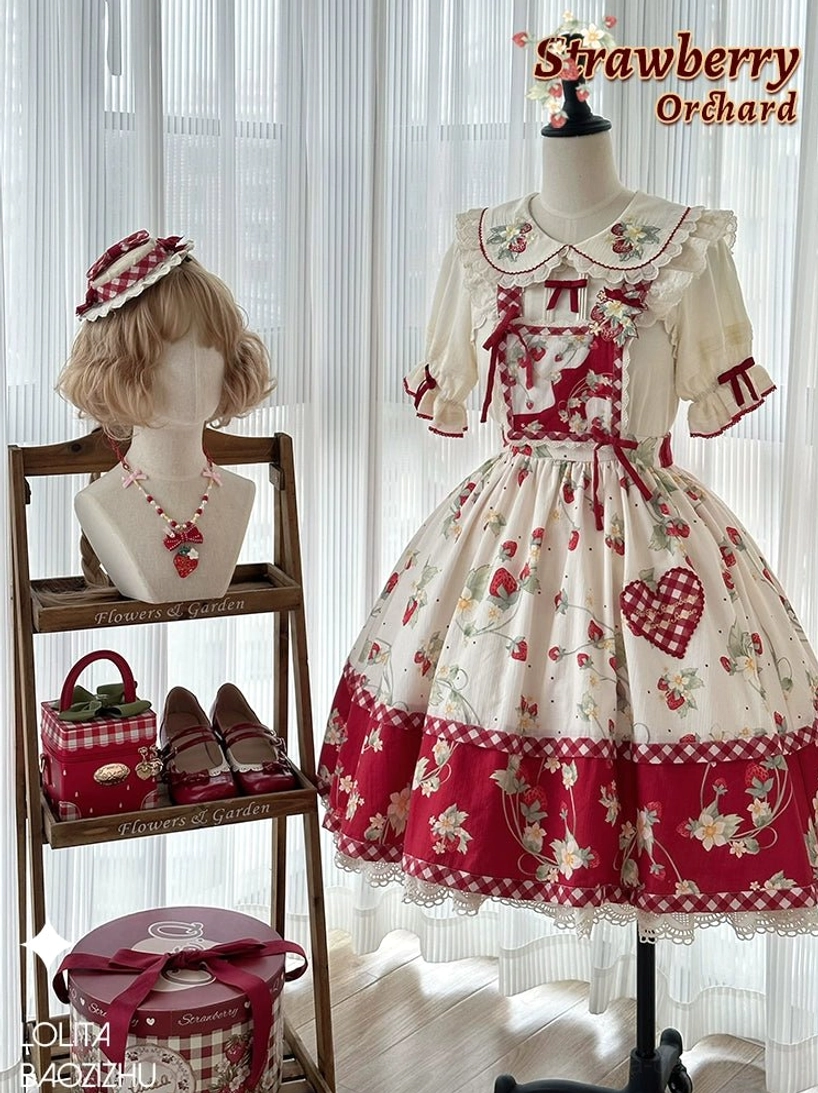Strawberry sweet lolita blouse and matching skirt display with coordinating accessories including headwear necklace handbag and shoes on display shelf