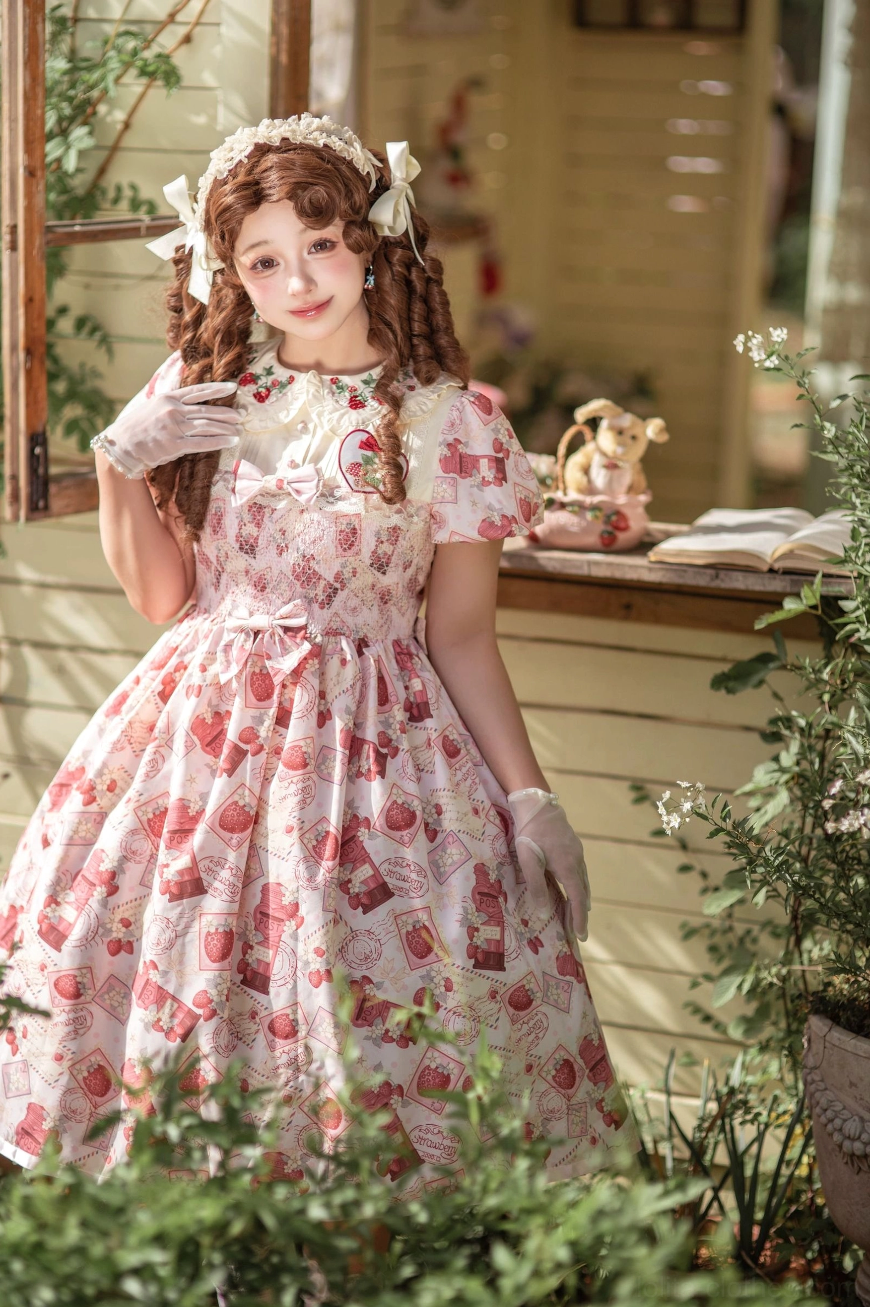 Strawberry Lolita OP dress paired with small structured handbag and vintage-inspired accessories, complete coordinate for events and social gatherings