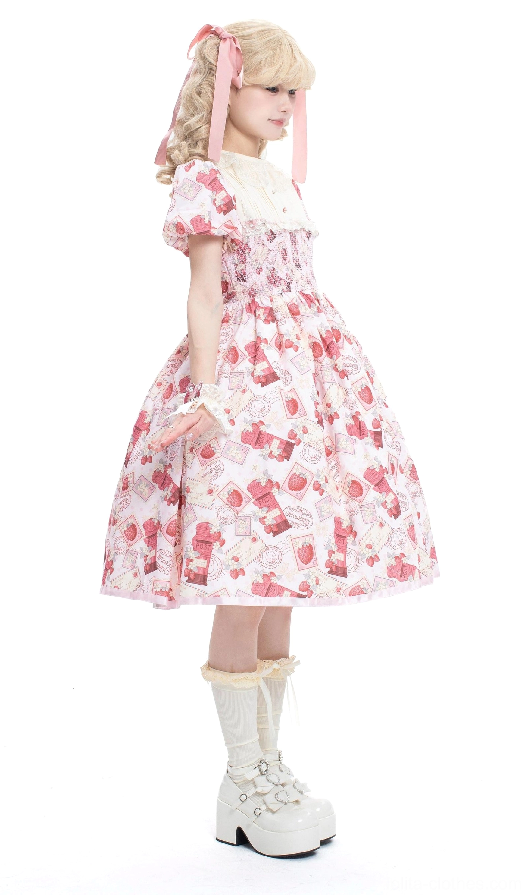 Strawberry print Lolita OP dress puff sleeve detail showing gathered ruffled edges, voluminous silhouette, authentic sweet lolita design elements close-up