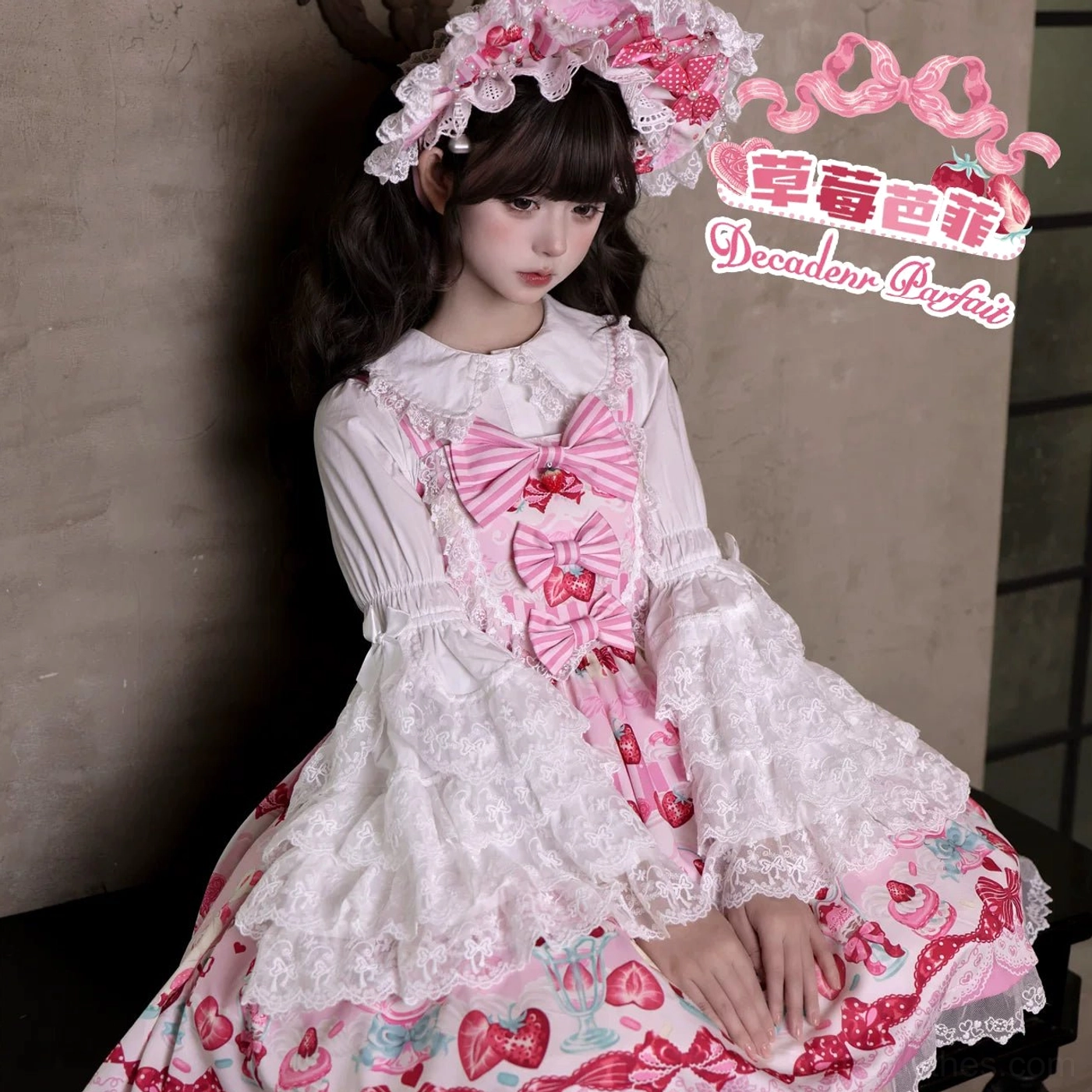 Strawberry Parfait sweet lolita JSK dress close-up detail of hime sleeve inner wear lace flares large front bow and strawberry print with ruffled hem