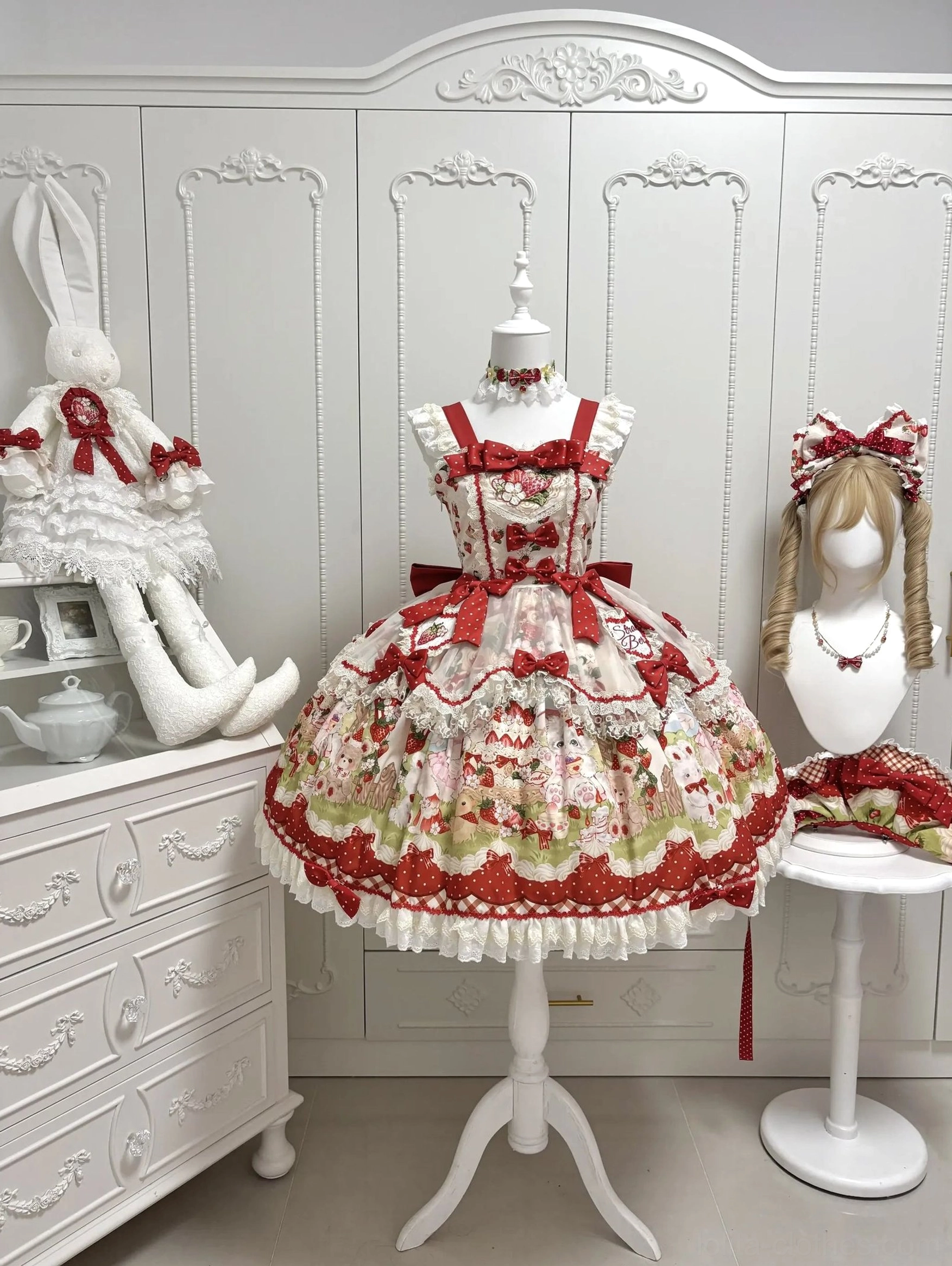 Strawberry sweet Lolita JSK dress flutter sleeve blouse option detail showing ruffled design, white polyester fabric, delicate construction for layered Lolita ensemble
