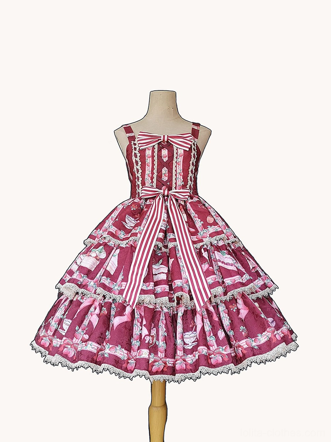 Strawberry Tea themed tiered ruffle lolita JSK dress wine red burgundy three-quarter front view dress form off-white studio background striped bodice large waist bow layered lace-trimmed skirt