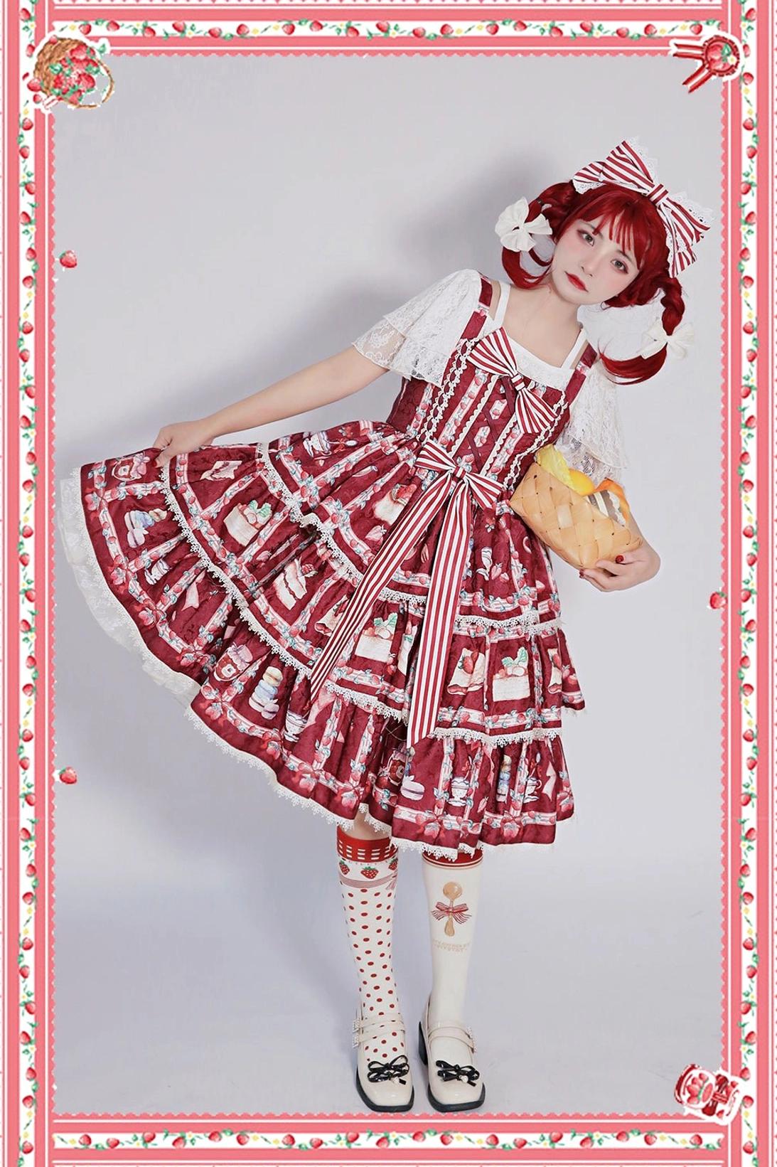 Strawberry Tea tiered ruffle lolita JSK dress wine red colorway full body three-quarter front view model wearing matching hair bow bread basket white blouse striped socks black Mary Jane shoes