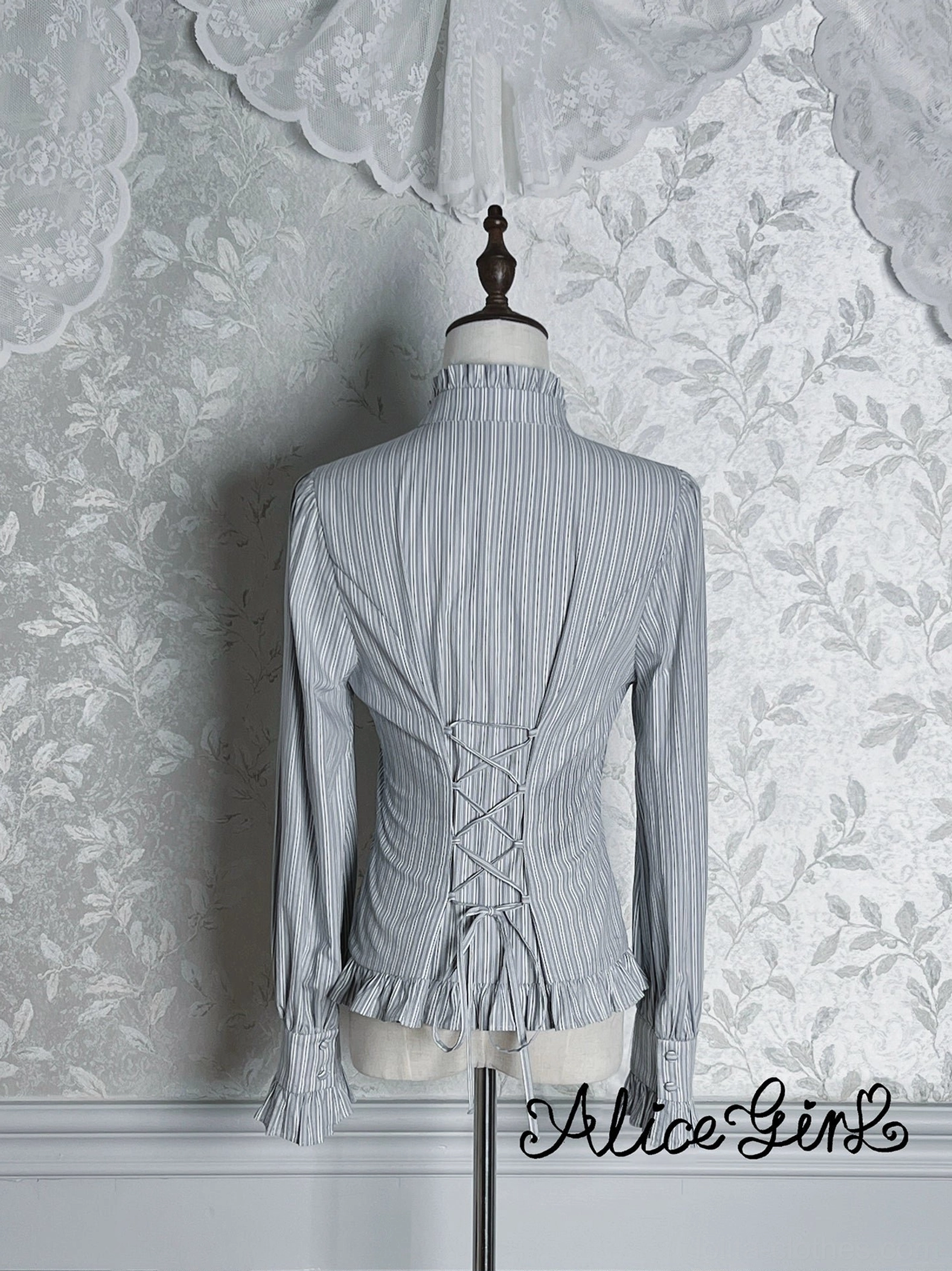 Gray-blue striped lolita blouse back view showing adjustable lace-up corset-style closure and flared cuffs