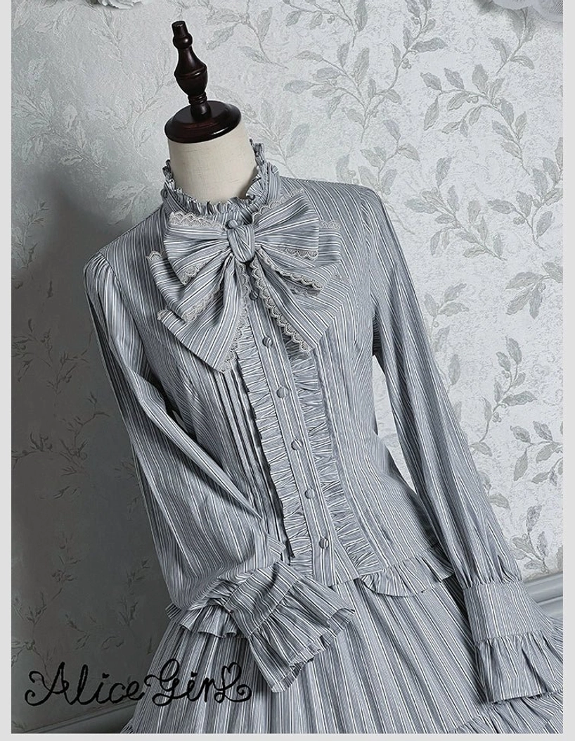 Flared ruffled sleeve cuff of brown striped Victorian lolita blouse showing voluminous design detail