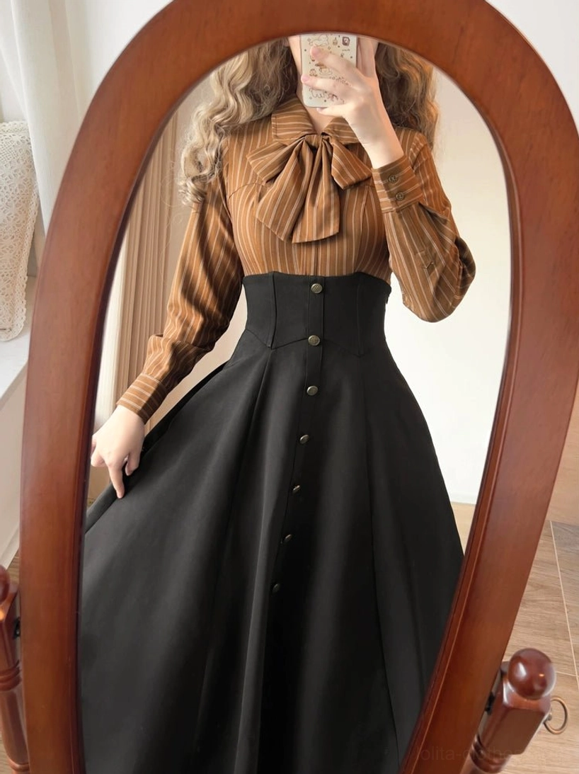 Classic Lolita striped blouse sleeve detail long-sleeve design, button cuff, ruffled trim finishing, vintage aesthetic