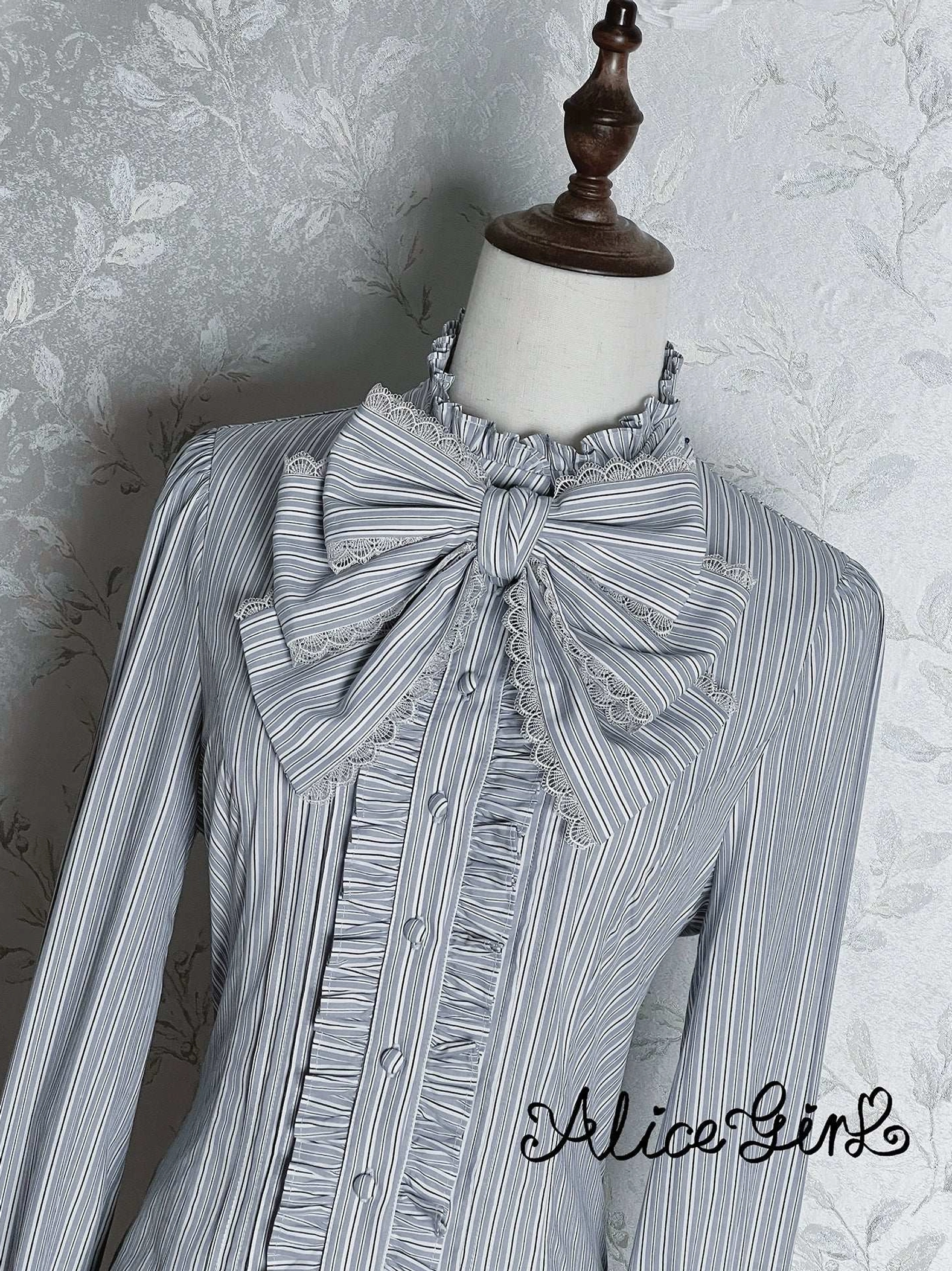 Gray-blue striped lolita blouse sleeve length and arm fit demonstration on mannequin