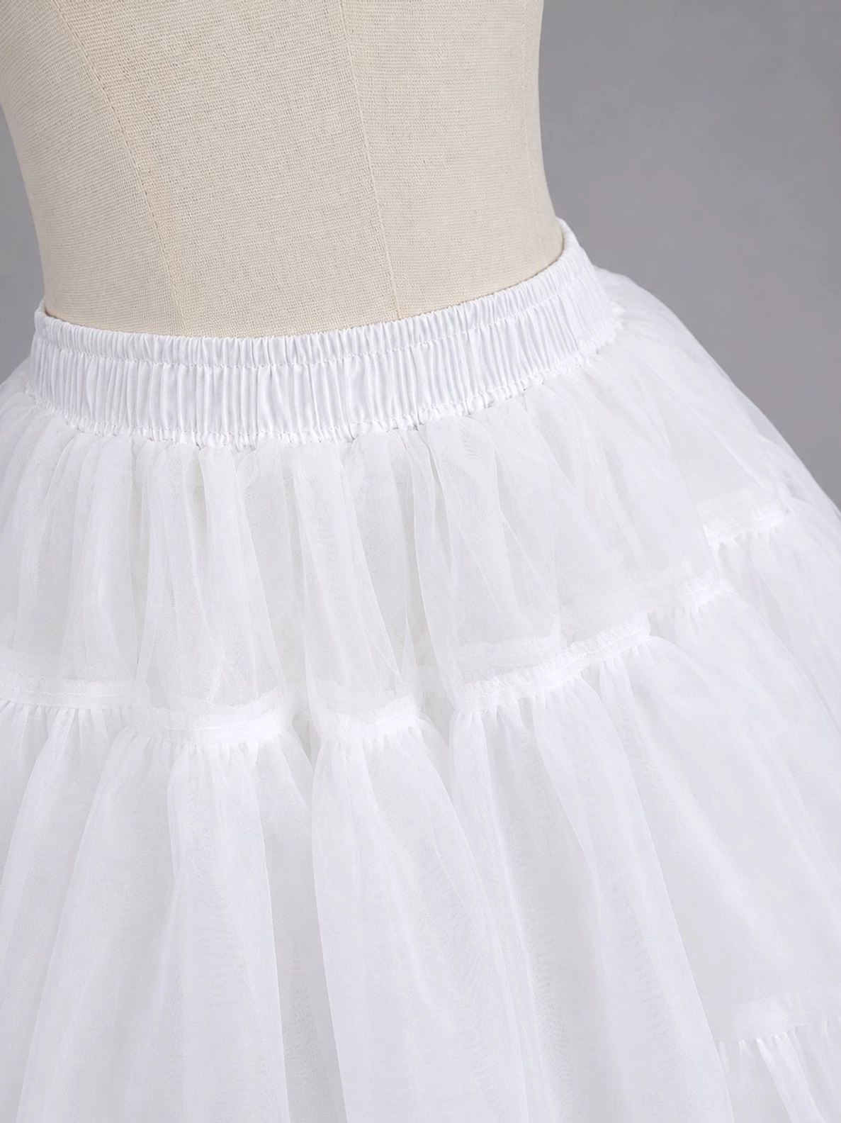Sugar puff petticoat showing elastic waistband comfort fit and volume distribution across full skirt structure