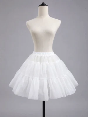 White high-volume sugar puff petticoat front view on dress form mannequin showing tiered ruffled fluffy A-line silhouette with elastic waistband