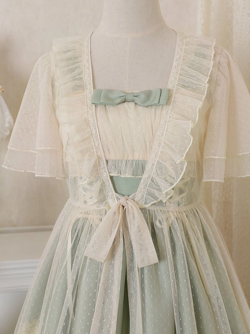 Sunflower lolita JSK dress neckline and chest detail showing decorated bow at neckline crossed ties on both sides construction and square neckline framing