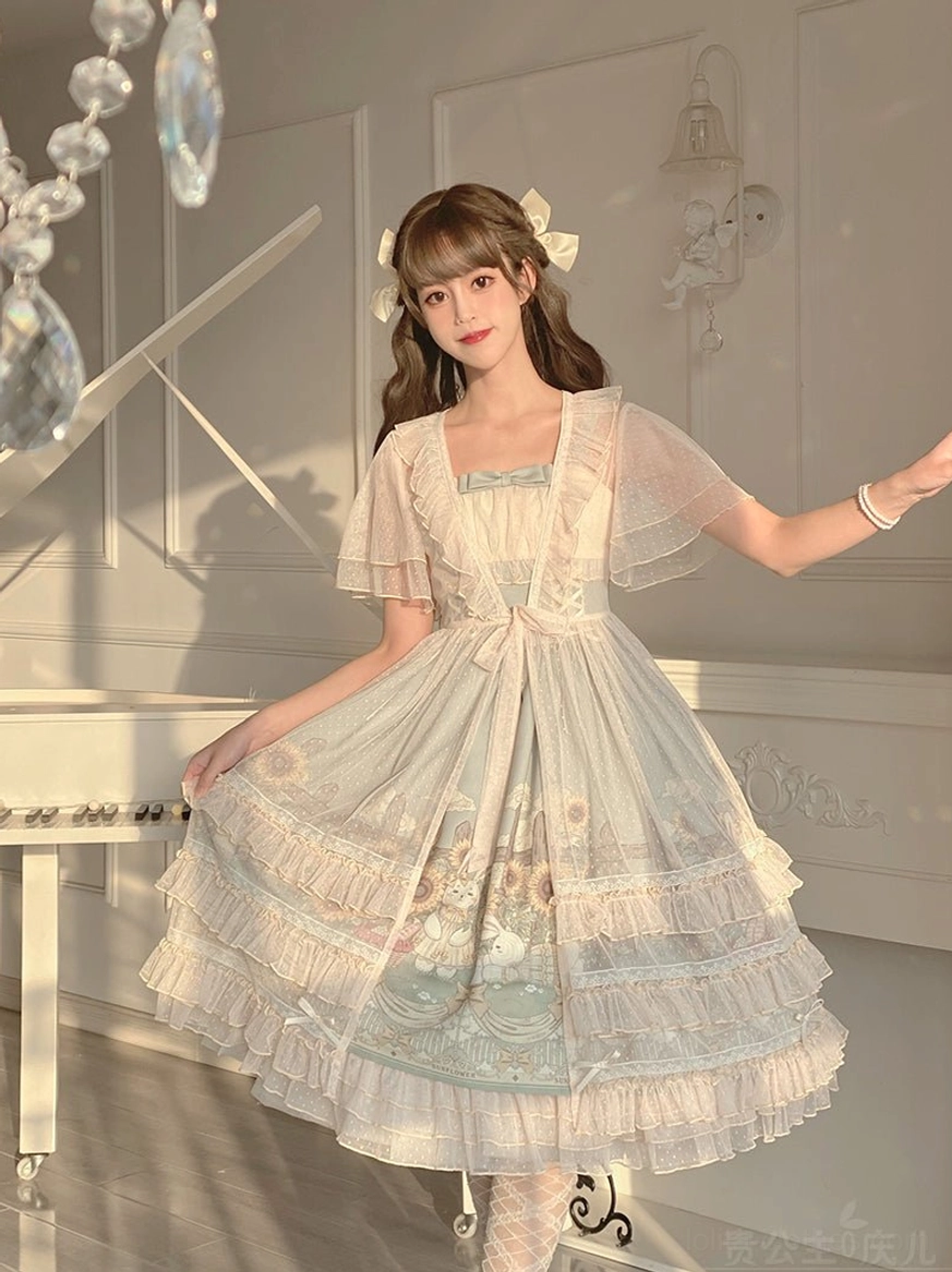 Sunflower printed lolita JSK dress full-body side standing shot on model in airy white piano room showing waist bowknot tiered ruffle hem soft pastel color silhouette