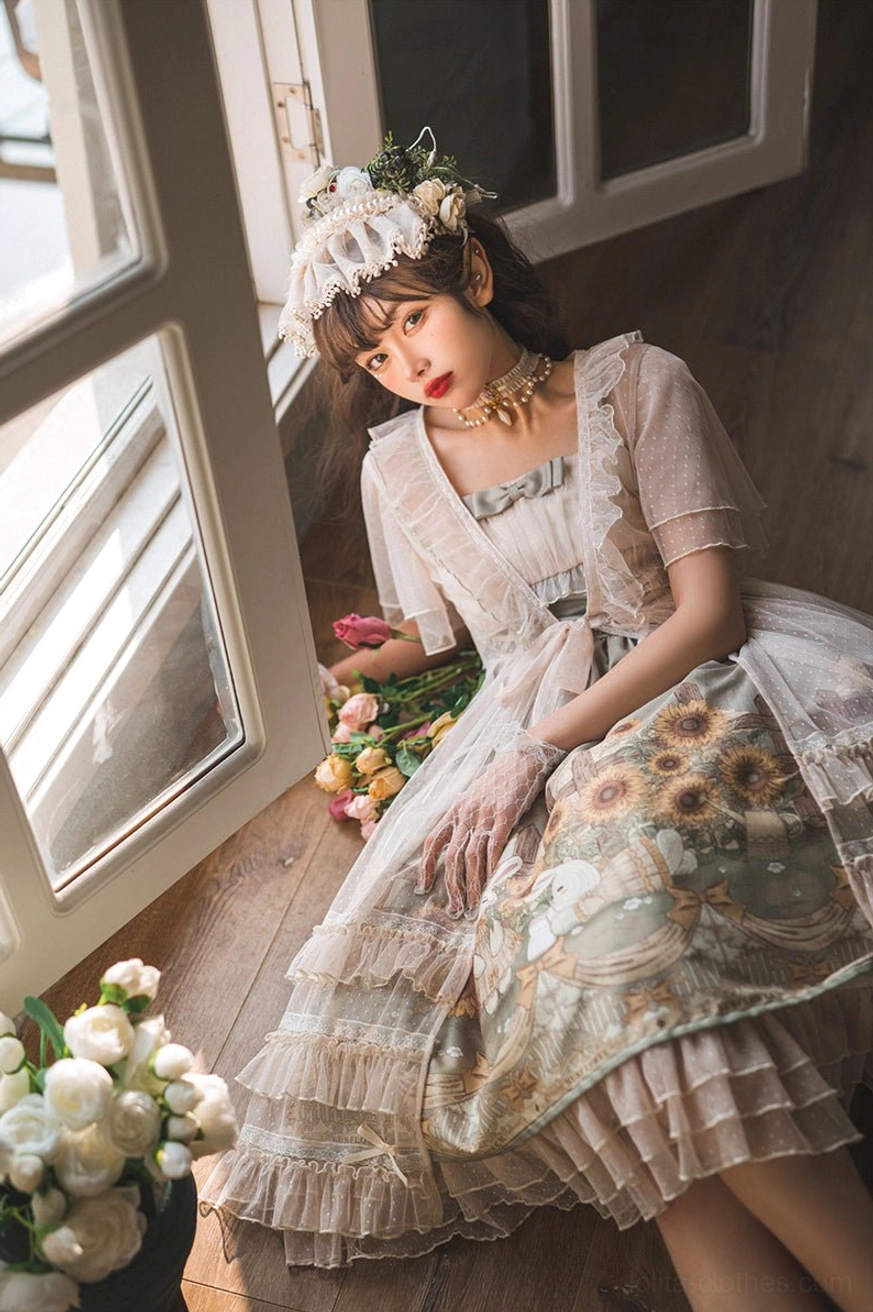 Sunflower printed lolita jumper skirt half-body sitting indoor shot on model with flower props beside glass window showing sunflower pattern skirt floral headpiece elegant square neck