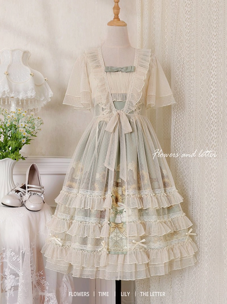 Sunflower lolita JSK dress with tulle overlay showing complete ensemble from front demonstrating full lolita silhouette volume and sheer tulle polka dot overlay effect