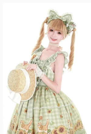 Sweet lolita cat ear KC headband and matching plaid flower ball brooch worn by model with blonde twin ponytails in green gingham lolita dress with sunflower and cat print motifs