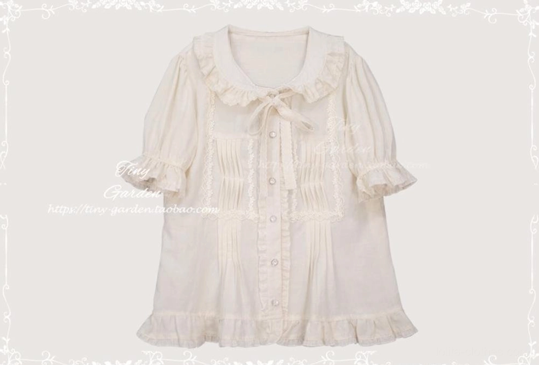 Short-sleeve beige Peter Pan collar Lolita blouse with bow tie and pleated front, flat lay front product display showing ivory tone and puff sleeve details