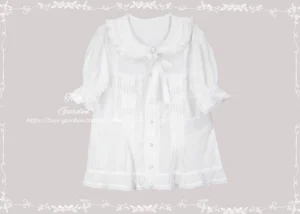 Short-sleeve white Peter Pan collar Lolita blouse with removable bow tie, front view showing pleated chest panel and ruffled cuff details, flat lay product photography