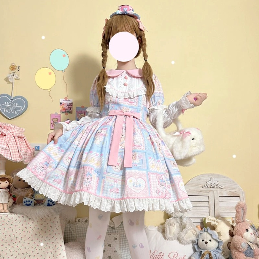 Low-angle full-body shot of Sweet Bunny Bear Lolita OP dress on model with pink loafers, showcasing front ruffled chest panel, flared lace-trimmed skirt, pastel balloon decor backdrop