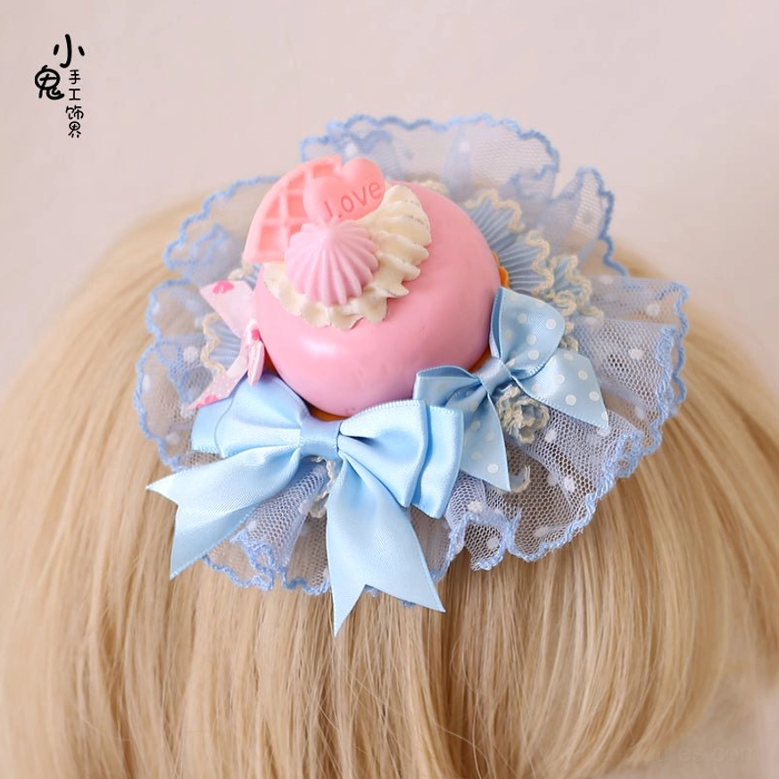 Sweet cake Lolita hairpin dual clip fastening system detail showing secure back-mounted clips for comfortable all-day wear and movement