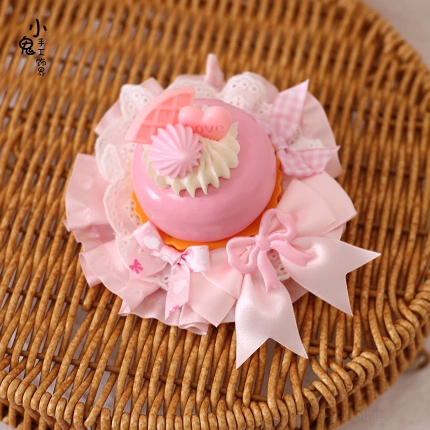 Sweet cake Lolita hairpin size #8 headdress showing miniature cake with embroidered lace trim butterfly accents and secure dual-clip fastening system