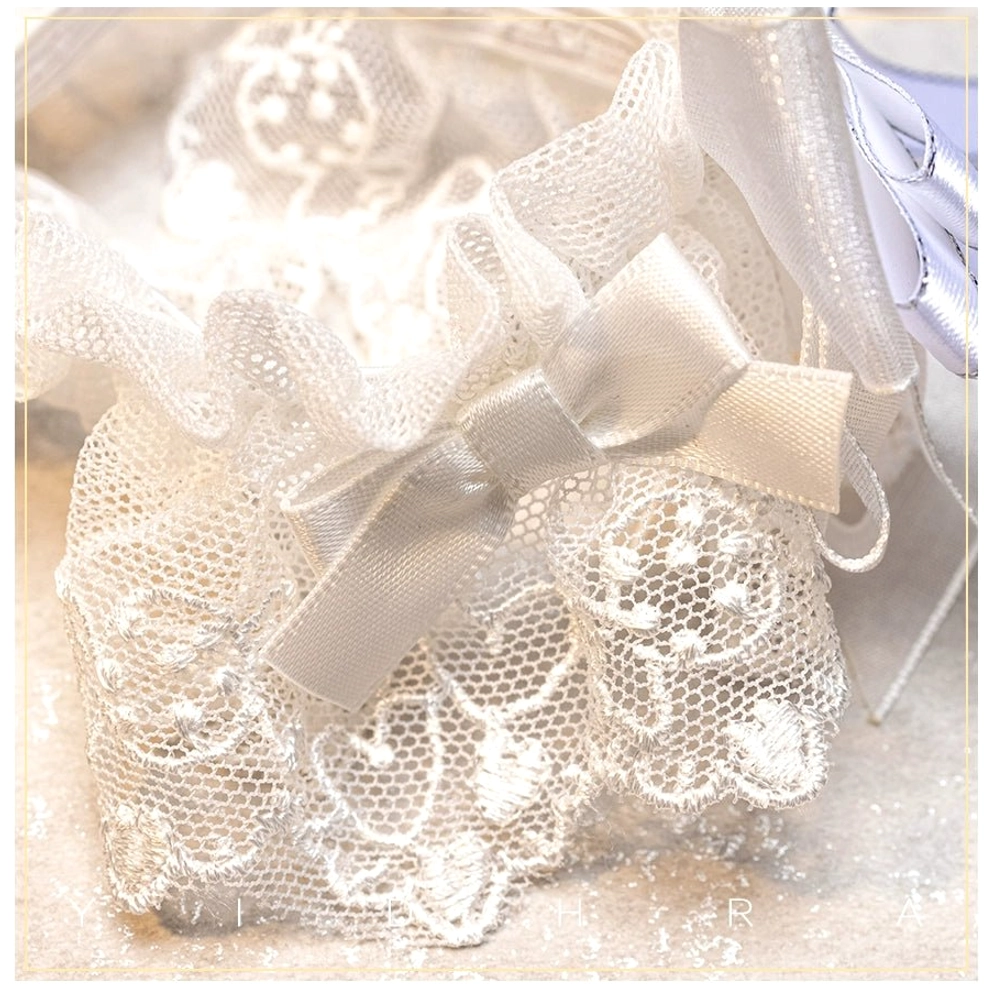 Sweet lolita ankle socks featuring extra padding in toe and sole areas with detachable lace ruffle and satin bow for comfort and styling flexibility