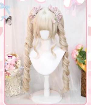 Sweet Lolita beige gold double ponytail Roman roll wig with blunt bangs displayed on white mannequin head in pastel floral scene with pink bow hair accessories