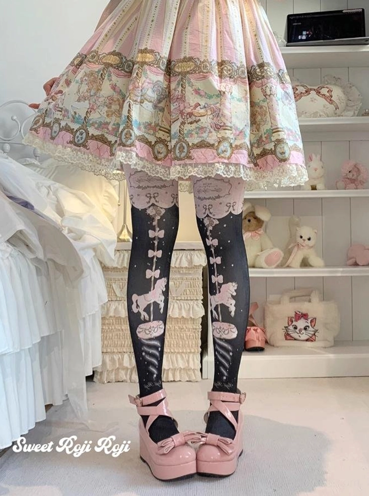 Sweet Lolita black carousel velvet pantyhose with pink bow print details worn with sweet Lolita coordinate black platform heels bedroom