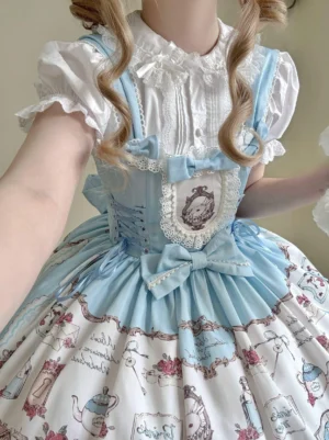 Sweet lolita coordinate set featuring blonde model wearing white ruffled inner blouse with peter pan collar layered under sky blue corset bodice with oversized bow and tea-party themed print skirt
