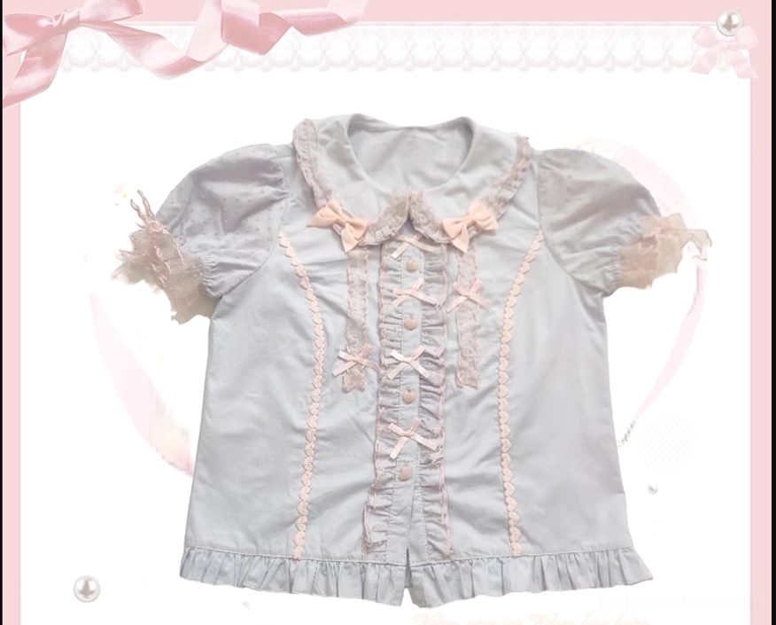 Sweet Lolita dress blouse and coordinating accessories photographed in styled arrangement
