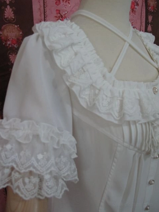 Left side close-up view of chiffon lolita blouse showing embroidered lace ruffled collar and cuffs with vertical bodice pleats detail