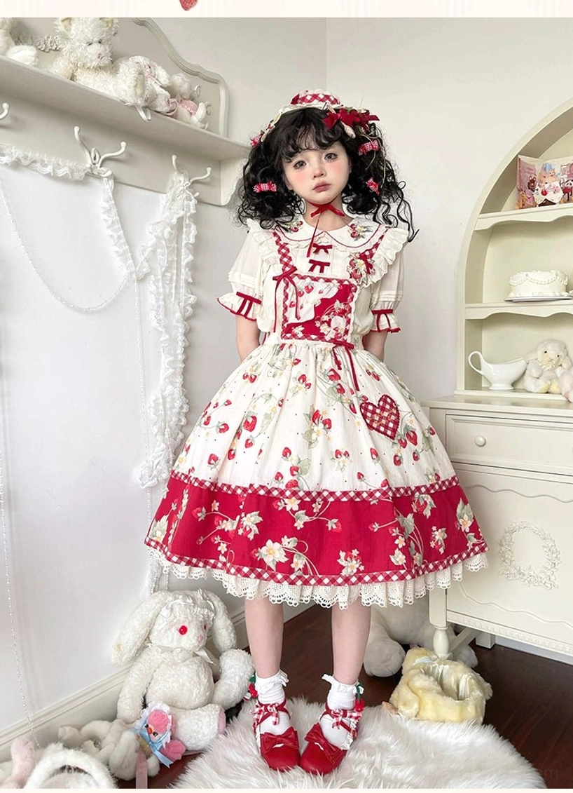 Scalloped lace hem and ruffle detailing of ivory strawberry sweet lolita blouse showing layered construction and pleated design