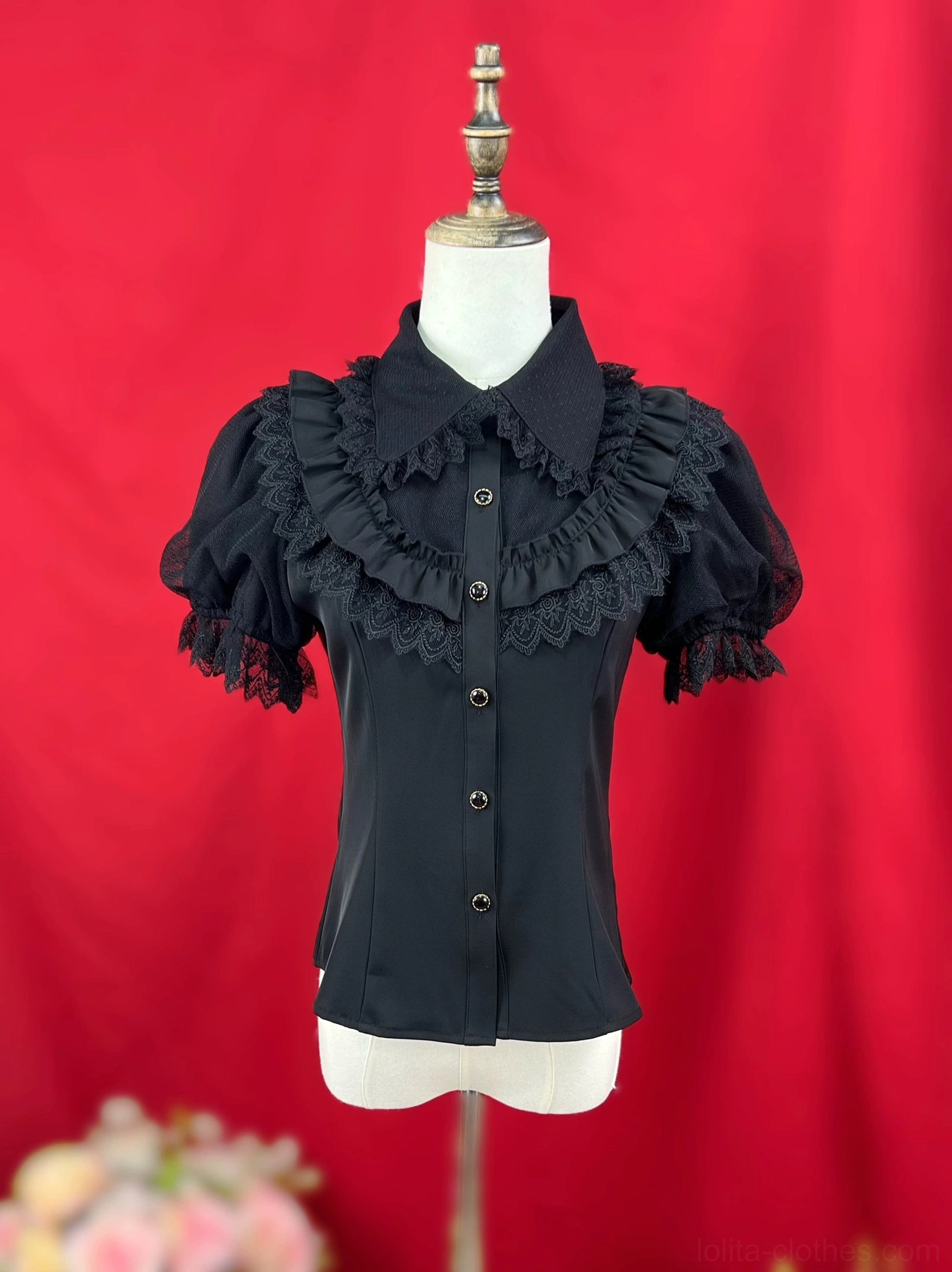 Sweet lolita blouse sleeve detail close-up showing layered lace trim tiered cuff construction hand-stitched construction quality craftsmanship