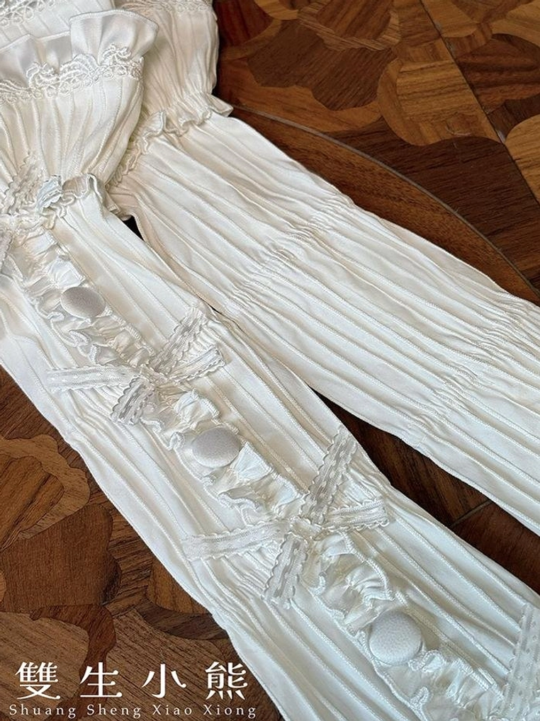 Lolita fashion wardrobe investment showing timeless design elements of sweet blouse with Peter Pan collar and lace-up back that remain relevant for years